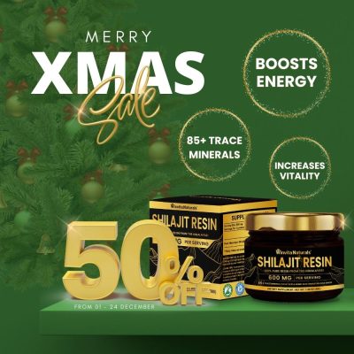 Festive Christmas sale advertisement featuring a 50% off offer on Winvita Naturals' Shilajit Resin, boasting energy boosts and increased vitality with 85+ trace minerals, set against a backdrop of a lush green Christmas tree with golden decorations.