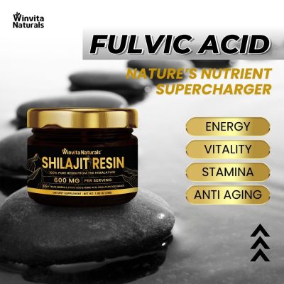 Image of a jar of Winvita Naturals Shilajit Resin on a reflective surface with smooth stones. The product is highlighted as a source of fulvic acid, with benefits listed as energy, vitality, stamina, and anti-aging.